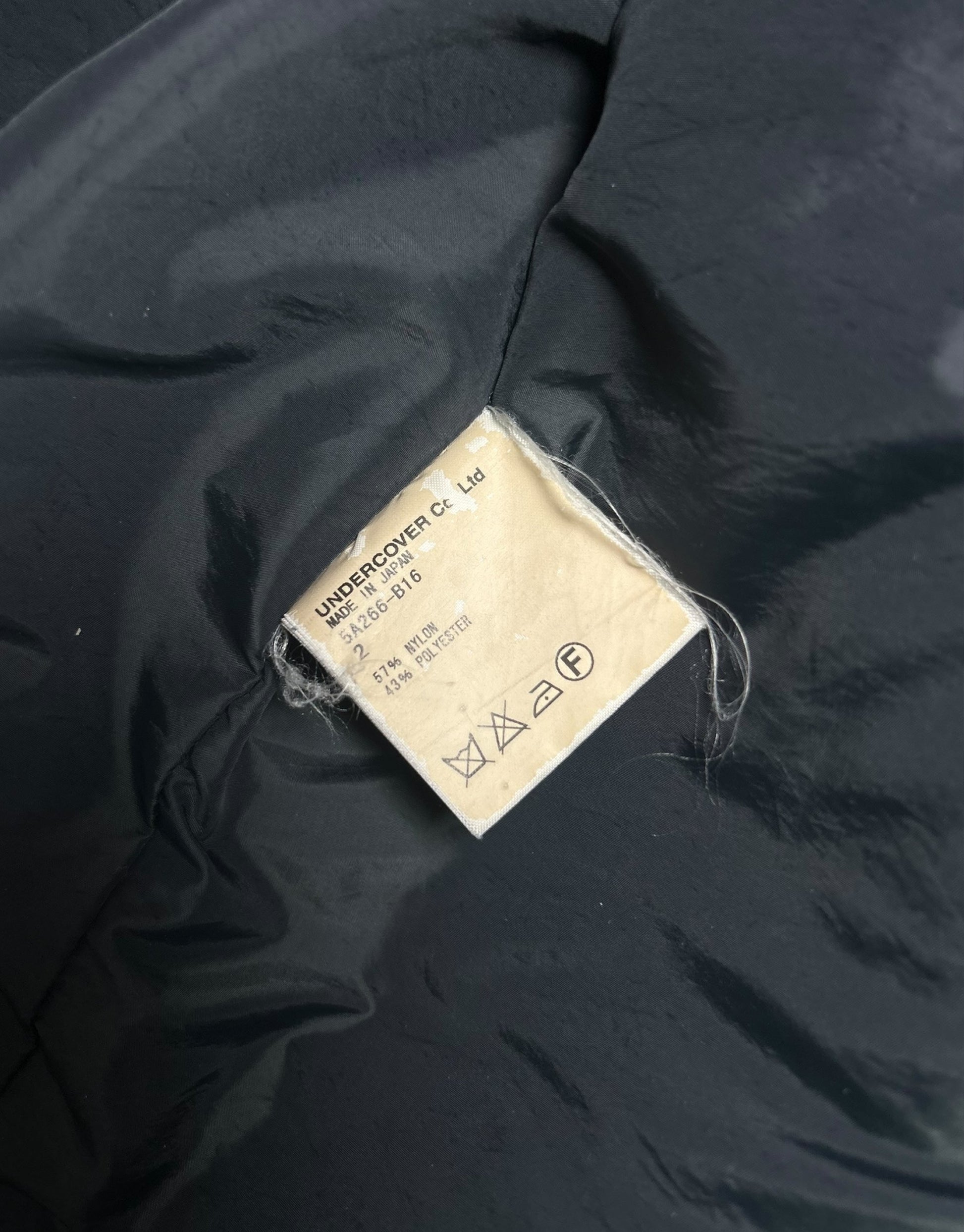 AW05 “Arts and Crafts” Patchwork Puffer Jacket Undercover